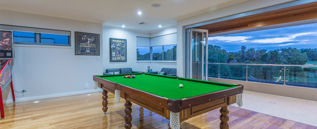 Snooker Room With Stack Doors Opening To A Balcony